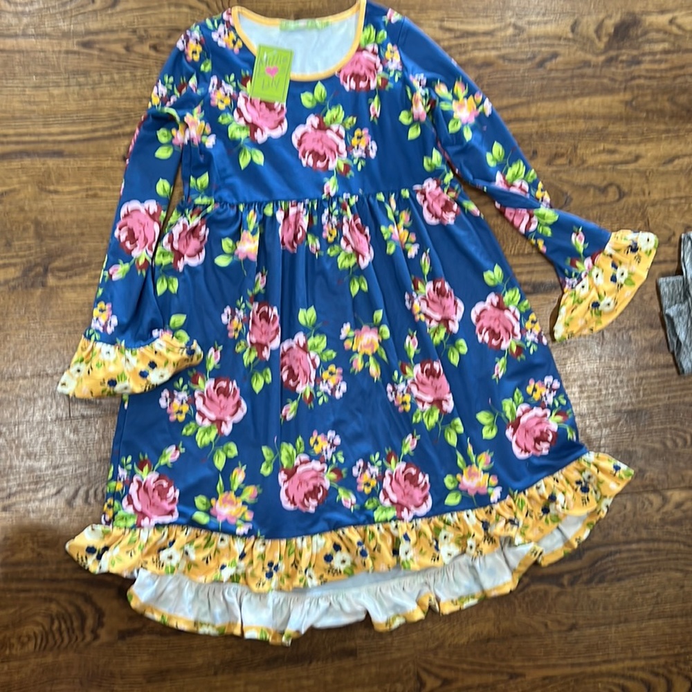 Millie Loves Lily knit dress w ruffle at sleeve and bottom. NWT